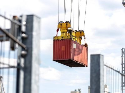 a-container-gantry-crane-on-a-rail-loads-the-conta-2023-11-27-05-02-18-utc-1