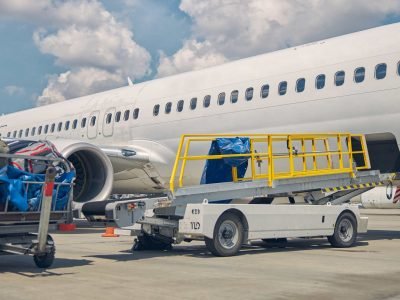 customer-luggage-loaded-on-carts-from-the-landed-a-2023-11-27-05-06-59-utc-1